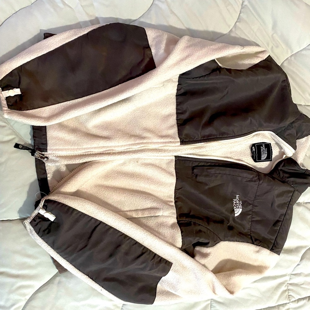 White and gray north face zip up